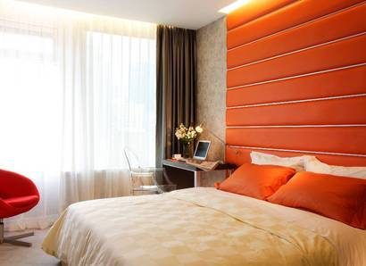 The Orange <br> Room Keep up tempo and energetic by immersing yourself in orange